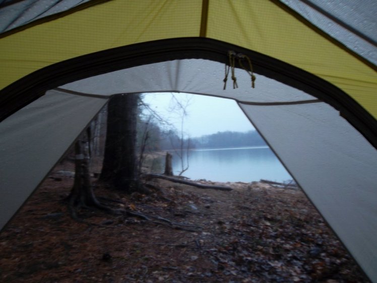 Watching the rain from the safety of the Sierra Designs Lightning UL2. 